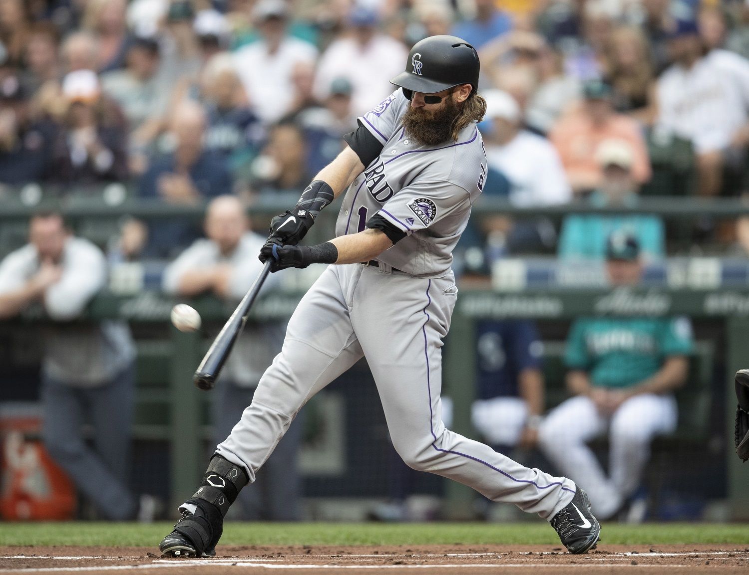 Colorado Rockies' Charlie Blackmon hits a solo home run off Seattle Mariners starting pitcher Felix Hernandez during the first inning of a baseball game, Friday, July 6, 2018, in Seattle. (AP Photo/Stephen Brashear)