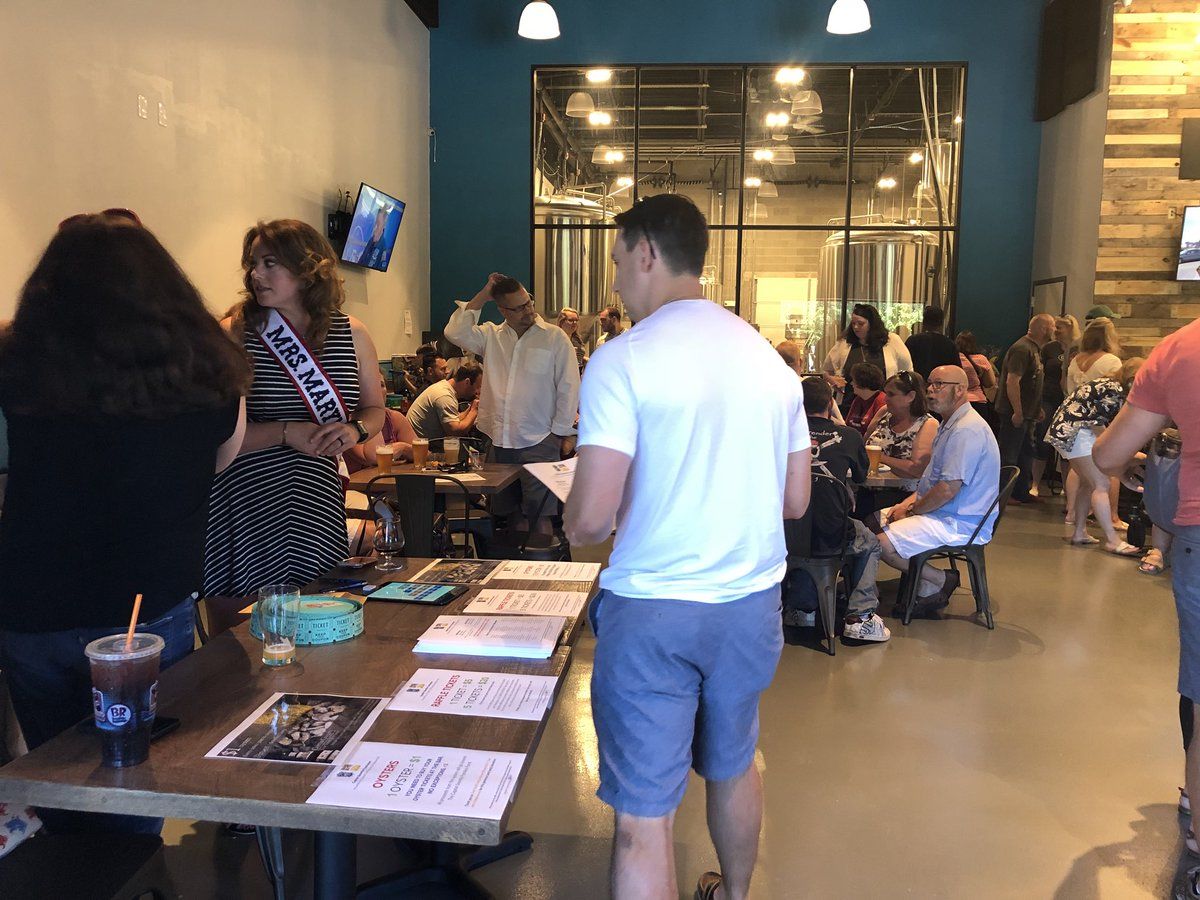All proceeds from the fundraiser raffle and silent auction, as well as $1 from every pint sold, will go to help those impacted by the shooting. (WTOP/Melissa Howell)
