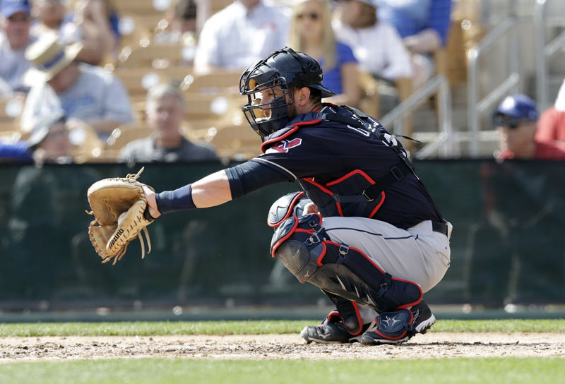 Cleveland Indians catcher Yan Gomes catches during warmups during the third inning of a spring training baseball game against the Los Angeles Dodgers, Thursday, March 1, 2018, in Glendale, Ariz. (AP Photo/Carlos Osorio)