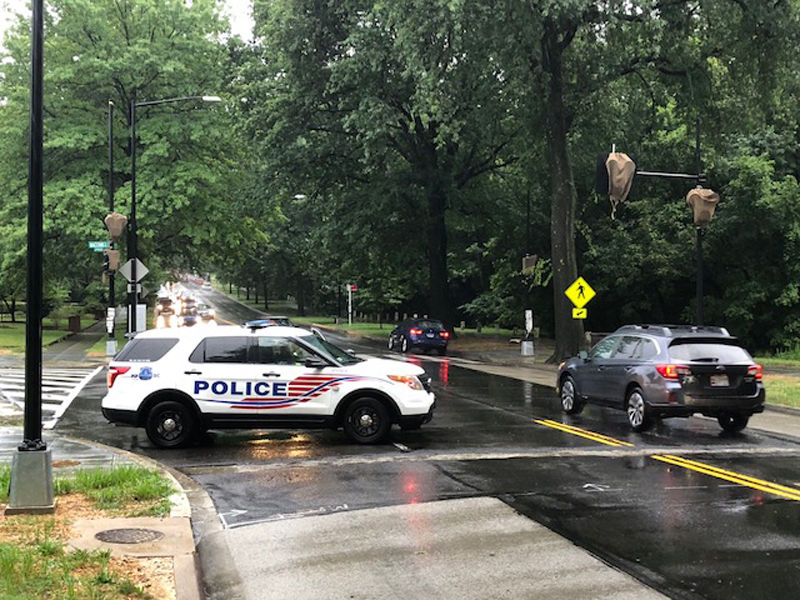 D.C. Police have blocked the lane going to American University circle. (WTOP/Dave Dildine)