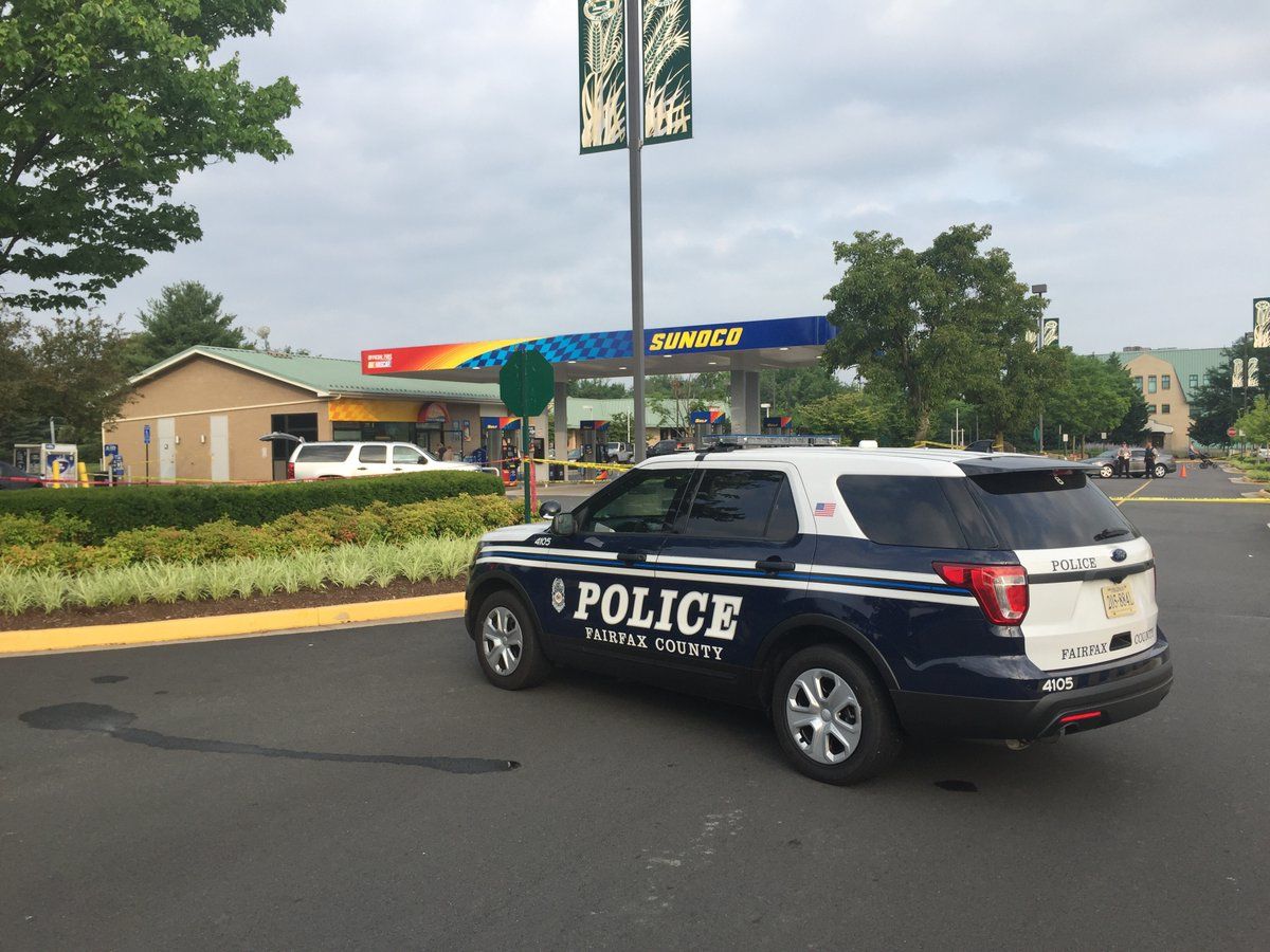 The Sunoco gas station in the Franklin Farm Village shopping center in Herndon remains an active crime scene Wednesday morning. (Courtesy Fairfax County Police) 