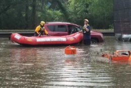 Arlington County Fire Department crews used boats to reach and rescue motorists stranded on the George Washington Parkway Tuesday afternoon. (Courtesy Arlington County Fire Department)