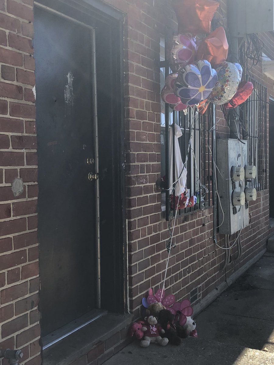 A makeshift memorial where 10-year-old Wilson was shot on Monday. (WTOP/Melissa Howell)