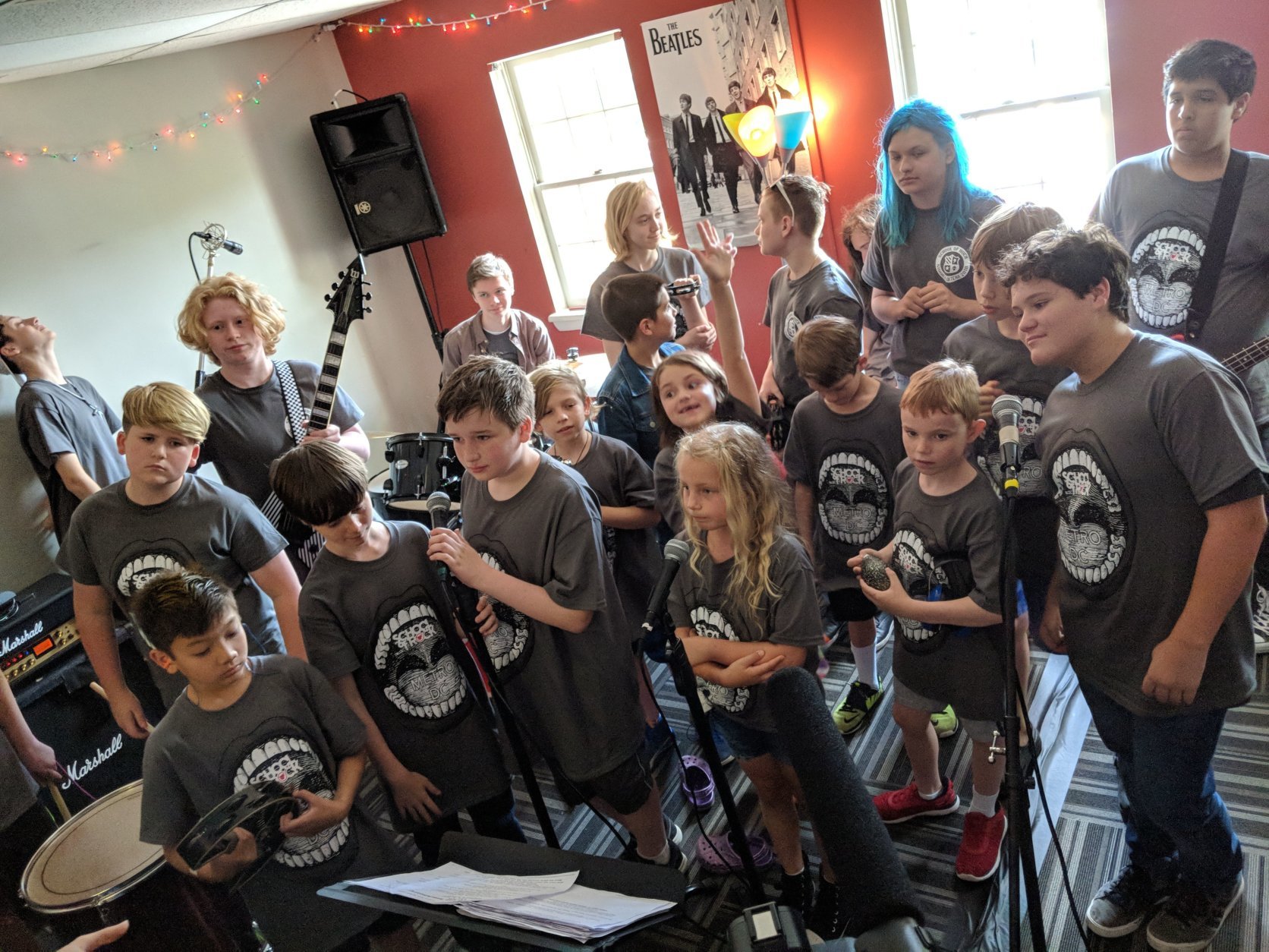 This bunch comprises two different summer camps running at the School of Rock in Vienna, Virginia. One is more advanced. The other is for the "rookies."(WTOP/Jack Pointer)