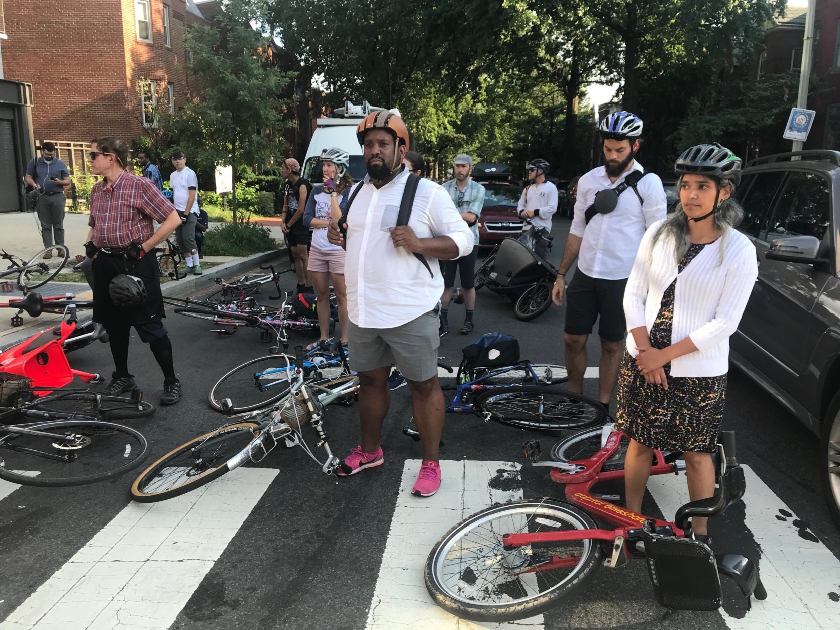 During the Tuesday evening rush hour, dozens of bicyclists laid down their bikes in a brief, silent protest around H and 3rd streets in Northeast D.C. (WTOP/Dick Uliano)