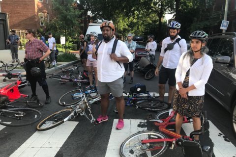 Bicyclists paused on H Street ask DC to increase road safety after fatal crash