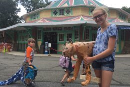 Claira Baisinger Rosen of Bethesda, Maryland, thinks Glen Echo Park is great because of all the different camps where kids can make a lot of different art. She created the paper mache leopard attending Carousel Animals Camp For Teens. (WTOP/Kristi King)
