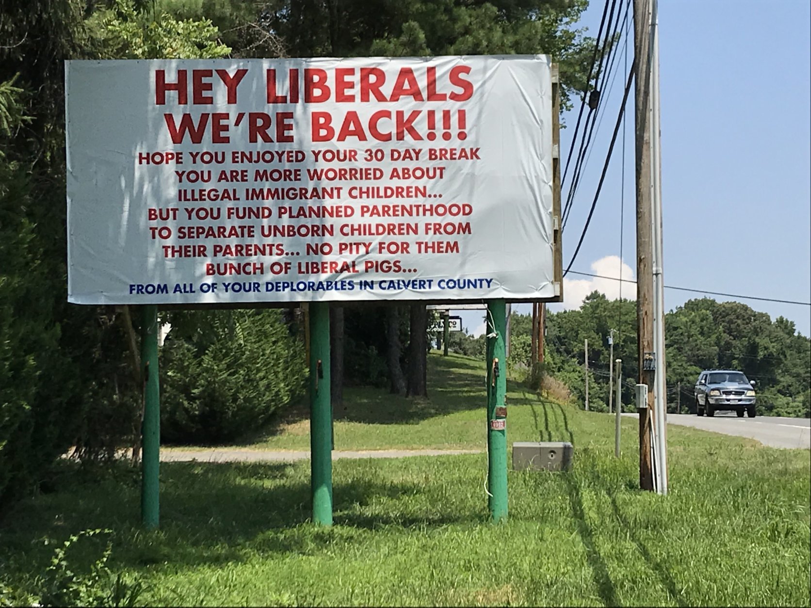 The sign is posted on a billboard along Maryland Route 4 at Bowie Shop Road in Huntingtown. (WTOP/Michelle Basch)