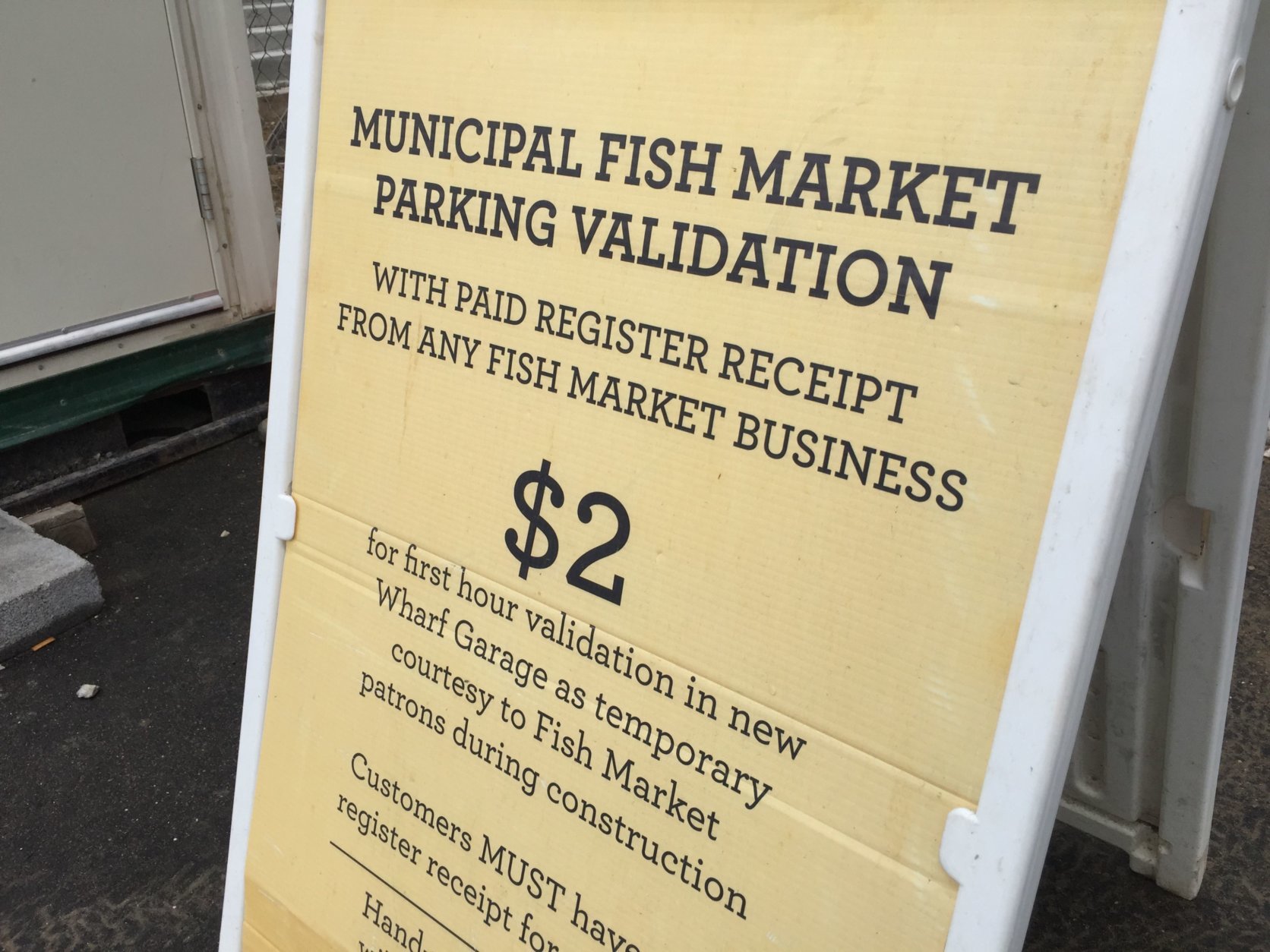 Construction at The Wharf has eliminated parking spaces immediately in front of the Fish Market, but you can still get an affordable spot with validation. (WTOP/Kristi King)