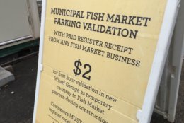 Construction at The Wharf has eliminated parking spaces immediately in front of the Fish Market, but you can still get an affordable spot with validation. (WTOP/Kristi King)