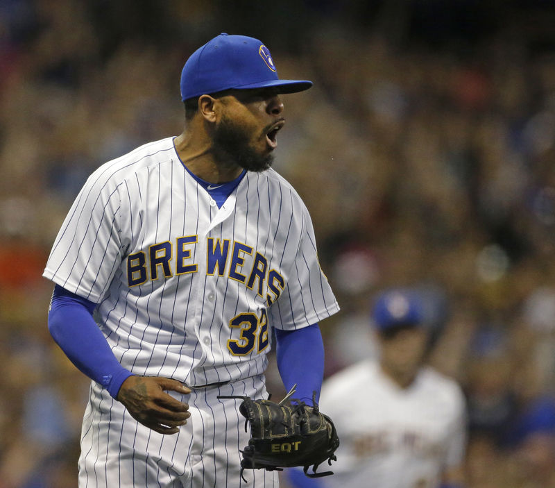 Milwaukee Brewers' Jeremy Jeffress reacts during the eighth inning of a baseball game against the Atlanta Braves Friday, July 6, 2018, in Milwaukee. (AP Photo/Aaron Gash)