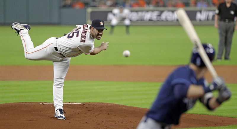 Houston Astros starting pitcher Justin Verlander, left, throws to Tampa Bay Rays' Matt Duffy during the first inning of a baseball game Tuesday, June 19, 2018, in Houston. (AP Photo/David J. Phillip)