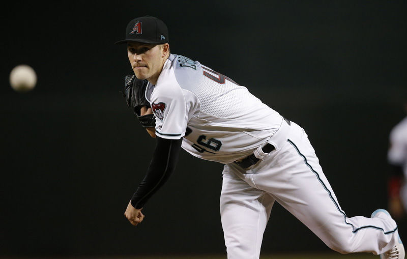 Arizona Diamondbacks starting pitcher Patrick Corbin warms up during the first inning of a baseball game against the San Francisco Giants Friday, June 29, 2018, in Phoenix. (AP Photo/Ross D. Franklin)