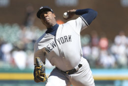 New York Yankees relief pitcher Aroldis Chapman throws during the ninth inning of the first game of a baseball doubleheader against the Detroit Tigers, Monday, June 4, 2018, in Detroit. (AP Photo/Carlos Osorio)