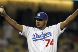 Los Angeles Dodgers reliever Kenley Jansen prepares to pitch to the St. Louis Cardinals in the ninth  inning of a baseball game in Los Angeles Friday, May 18, 2012. The Dodgers won, 6-5. (AP Photo/Reed Saxon)
