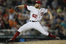 Washington Nationals relief pitcher Sean Doolittle throws during the ninth inning of the team's baseball game against the Baltimore Orioles at Nationals Park, Thursday, June 21, 2018, in Washington. The Nationals won 4-2. (AP Photo/Carolyn Kaster)