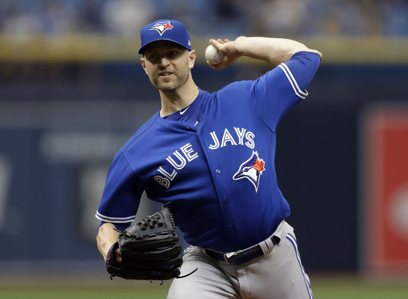 Toronto Blue Jays' J.A. Happ pitches to the Tampa Bay Rays during the first inning of a baseball game Wednesday, June 13, 2018, in St. Petersburg, Fla. (AP Photo/Chris O'Meara)