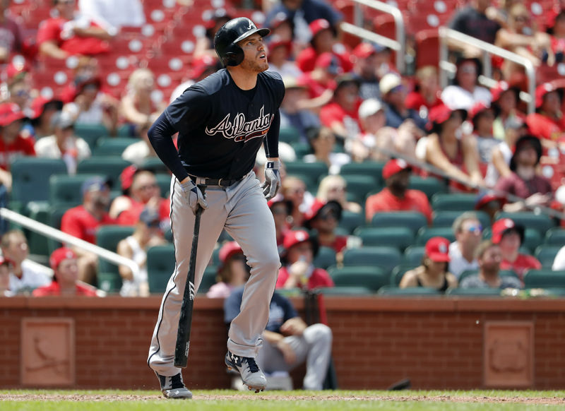 Atlanta Braves' Freddie Freeman watches his two-run home run during the sixth inning of a baseball game against the St. Louis Cardinals Sunday, July 1, 2018, in St. Louis. (AP Photo/Jeff Roberson)
