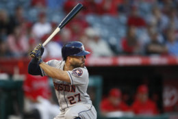 Houston Astros' Jose Altuve prepares for an at-bat during the first inning of a baseball game against the Los Angeles Angels, Monday, May 14, 2018, in Anaheim, Calif. (AP Photo/Jae C. Hong)