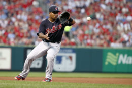 Cleveland Indians third baseman Jose Ramirez handles a grounder by St. Louis Cardinals' Tommy Pham before throwing Pham out at first during the third inning of a baseball game Wednesday, June 27, 2018, in St. Louis. (AP Photo/Jeff Roberson)