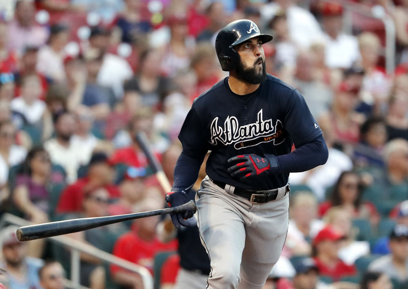 Atlanta Braves' Nick Markakis watches his grand slam during the fifth inning against the St. Louis Cardinals in a baseball game Saturday, June 30, 2018, in St. Louis. (AP Photo/Jeff Roberson)