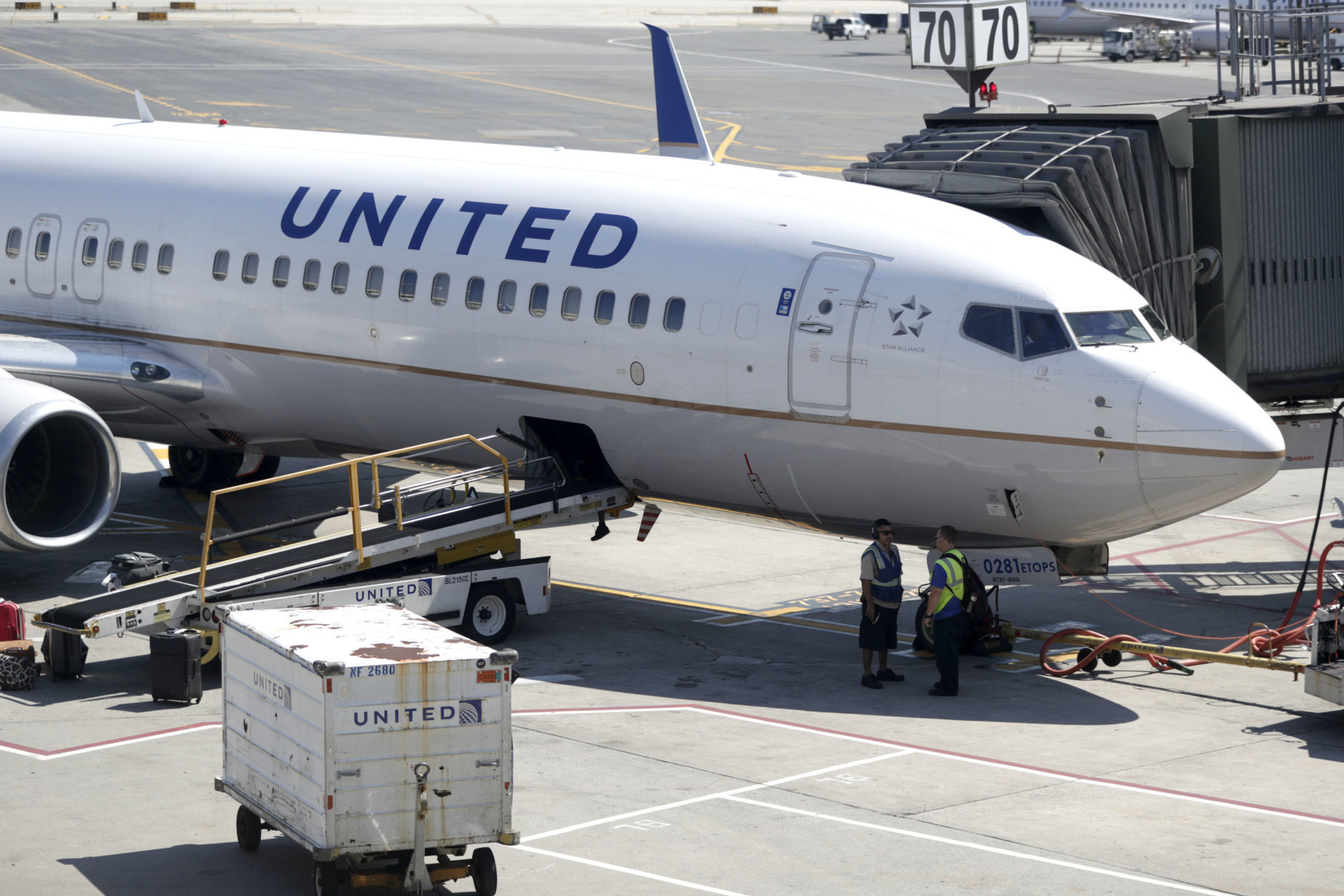 United has added more flights from Dulles to Florida cities on the Gulf Coast. 
In this photo, a United Airlines commercial jet sits at a gate at Terminal C of Newark Liberty International Airport, Wednesday, July 18, 2018, in Newark, N.J. (AP Photo/Julio Cortez)