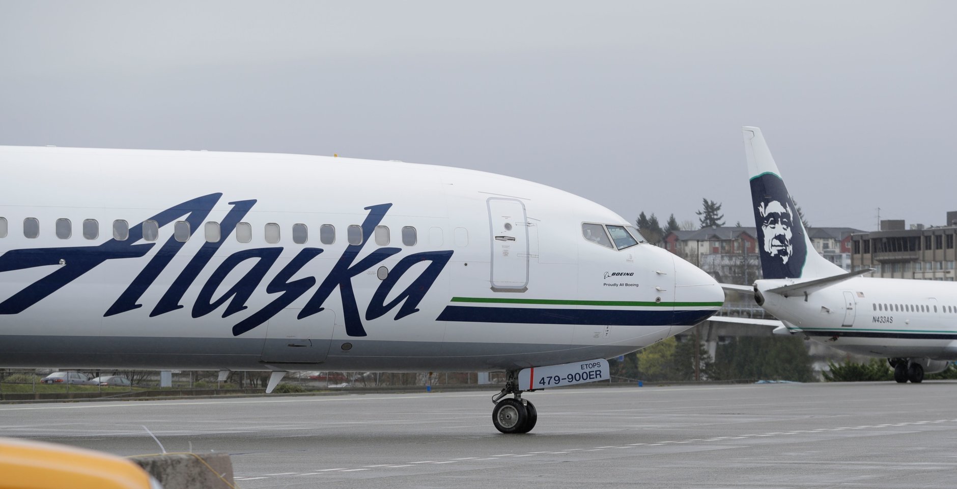An Alaska Airlines plane taxis Friday, April 13, 2018, at the Seattle-Tacoma International Airport in Seattle. (AP Photo/Ted S. Warren)