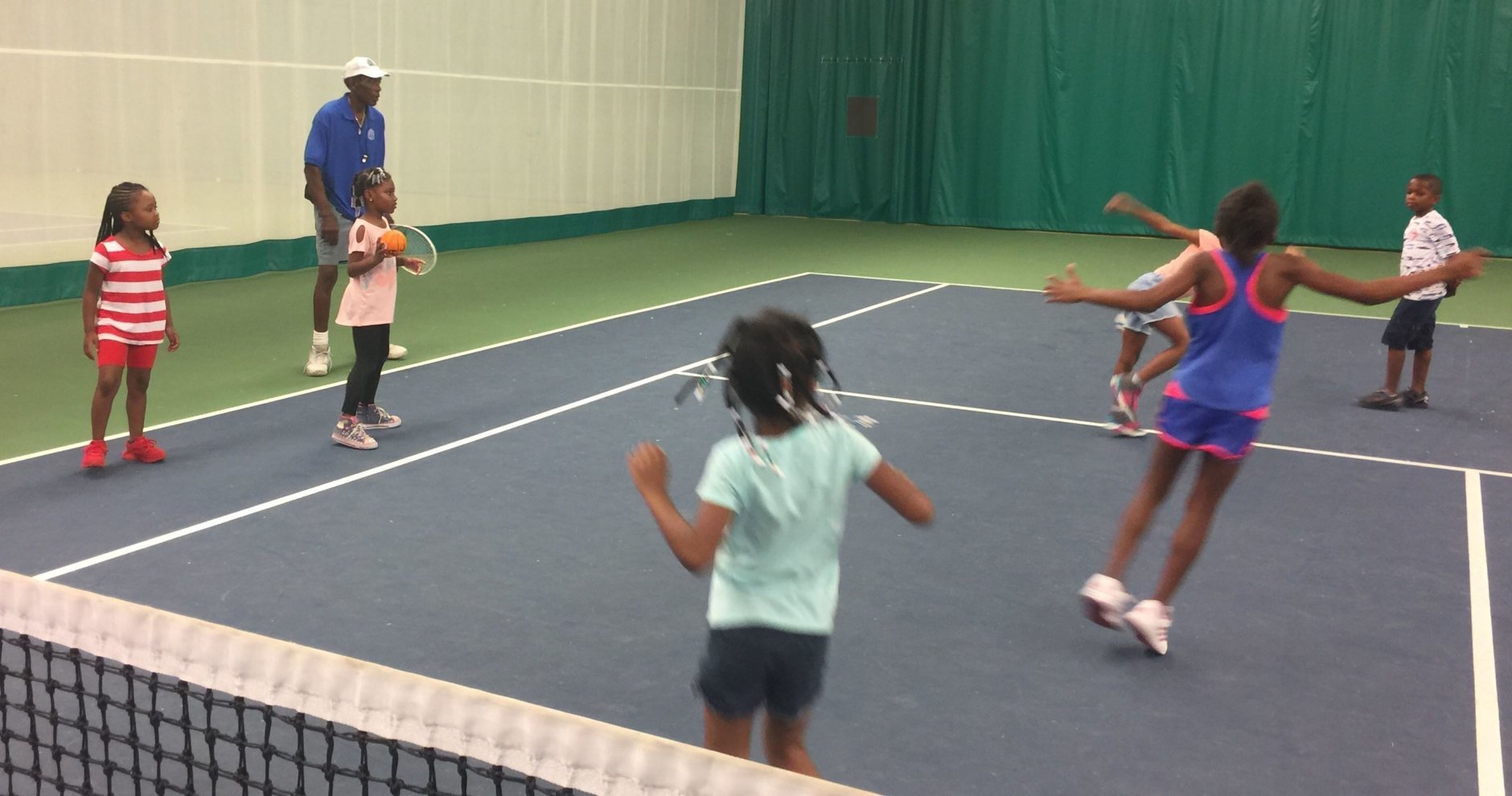Playing dodge-ball gets children familiar with moving around quickly on a tennis court. (WTOP/Kristi King)