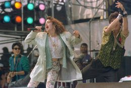 American singer Madonna, performs onstage with dancer during Live Aid famine relief concert at JFK Stadium in Philadelphia Pa., July 13,1985.(AP Photo/Amy Sancetta)