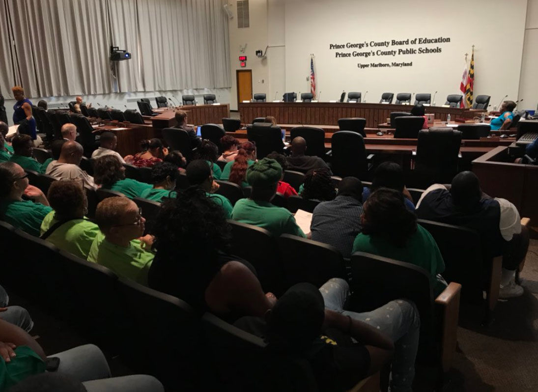 Attendees wait for the start of a Prince George's County School Board meeting on Thursday, July 12, 2018. (WTOP/Michelle Basch)