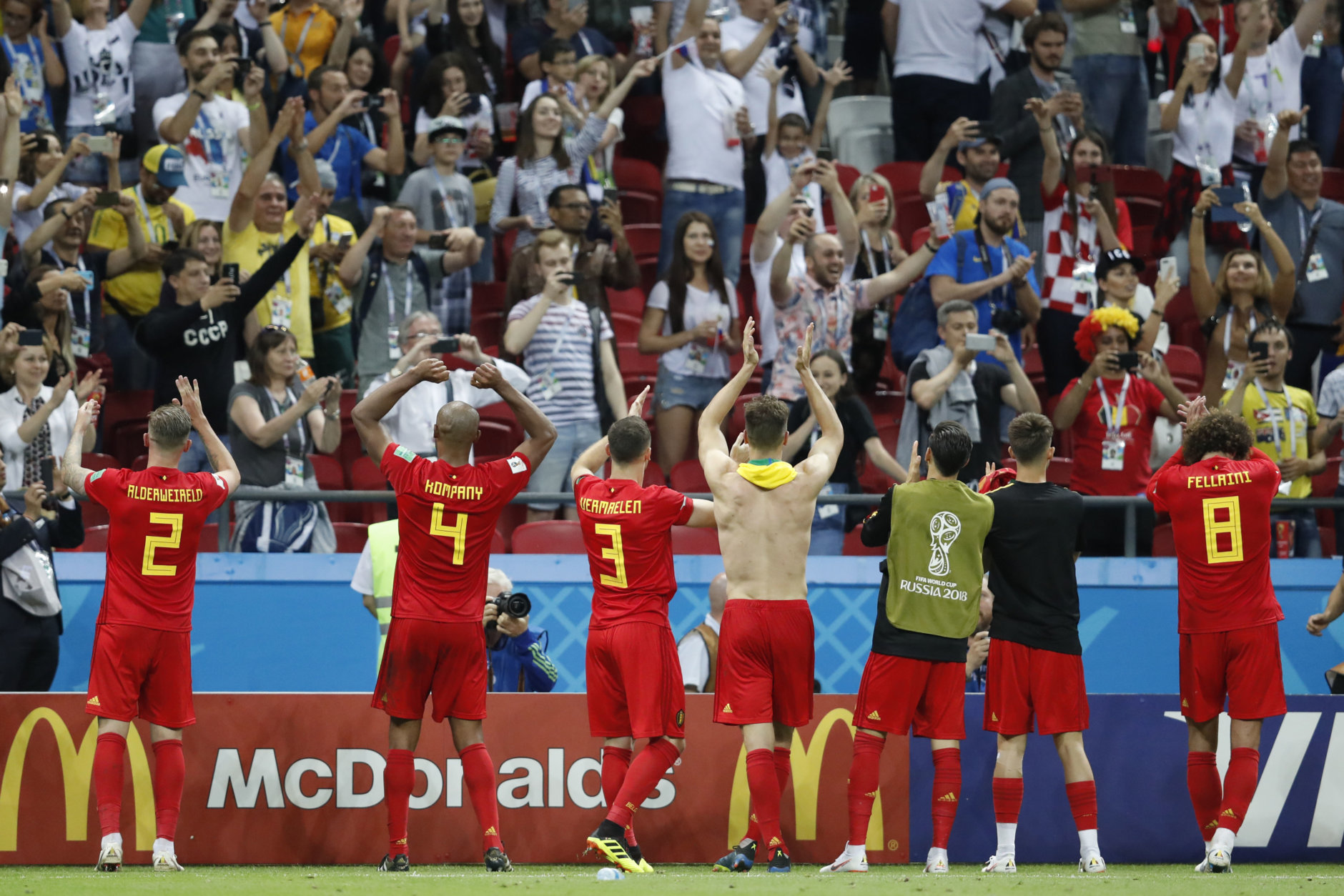 Belgium players and supporters celebrate at the end of the quarterfinal match between Brazil and Belgium at the 2018 soccer World Cup in the Kazan Arena, in Kazan, Russia, Friday, July 6, 2018. (AP Photo/Eduardo Verdugo)