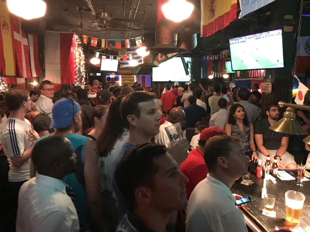 Lucky Bar in D.C. is packed for the Croatia vs. England semifinal match. (WTOP/Michelle Basch)