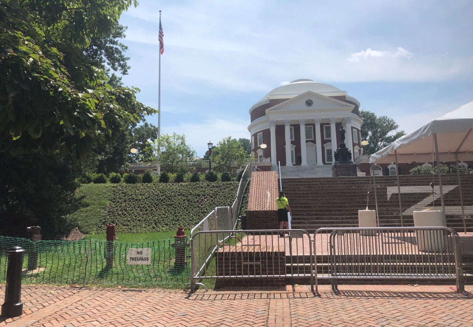 At UVa., “no trespass” signs and barricades surround the rotunda ahead of a Saturday morning “reflection and renewal” university event with tight security and planned protests on Grounds. (WTOP/Max Smith)