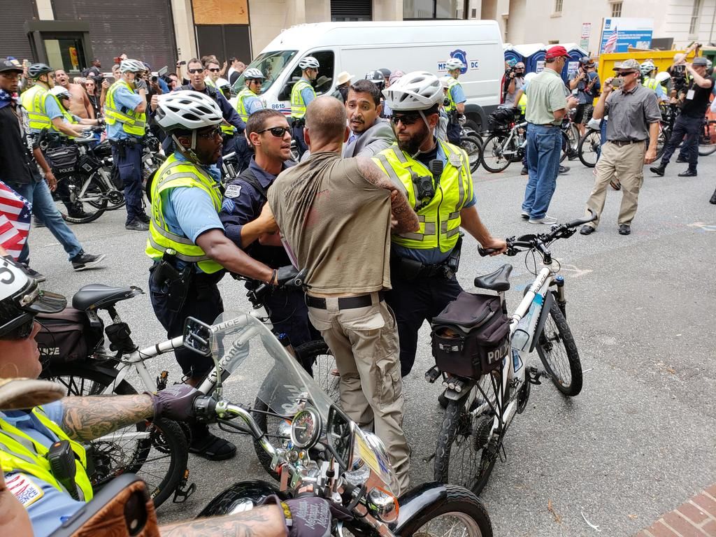 D.C. police stop a counterprotester who rushed toward the white nationalists marching to Lafayette Square. (Courtesy Wilson Dizard)