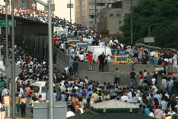 ** FILE ** Pedestrians leaving Manhattan flood New York's 59th St. Bridge to Queens in this Aug. 14, 2003 file photo, after a power blackout crippled the city. A year after the nation's worst ever blackout, utilities have made improvements and New York has spent millions of dollars on new high-tech gadgets to avert the chaos that followed. (AP Photo/Tina Fineberg, File)