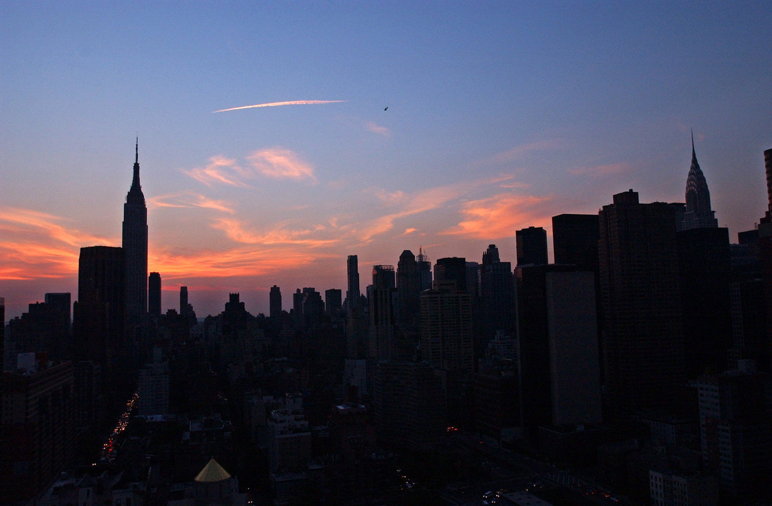 The New York City skyline is shown Thursday, Aug. 14, 2003. A massive power outage struck the eastern United States and parts of Canada on Thursday afternoon, stranding people in sweltering subways and sending office workers streaming into the streets in 90-degree heat. (AP Photo/Frank Franklin II)