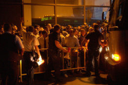 Crowds line up for buses at Port Authority bus terminal in New York during a massive power outage Thursday, Aug. 14, 2003, that stretched from New York to Detroit and into Canada. (AP Photo/Christie Johnston)