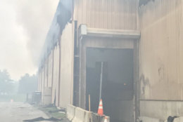 Battling the large fire, which broke out about 3 a.m. Wednesday, proved challenging in part because of limited water sources at the scene to battle the blaze. Firefighters hope to fully extinguish the fire by Friday. (Courtesy Montgomery County Fire and Rescue Service)