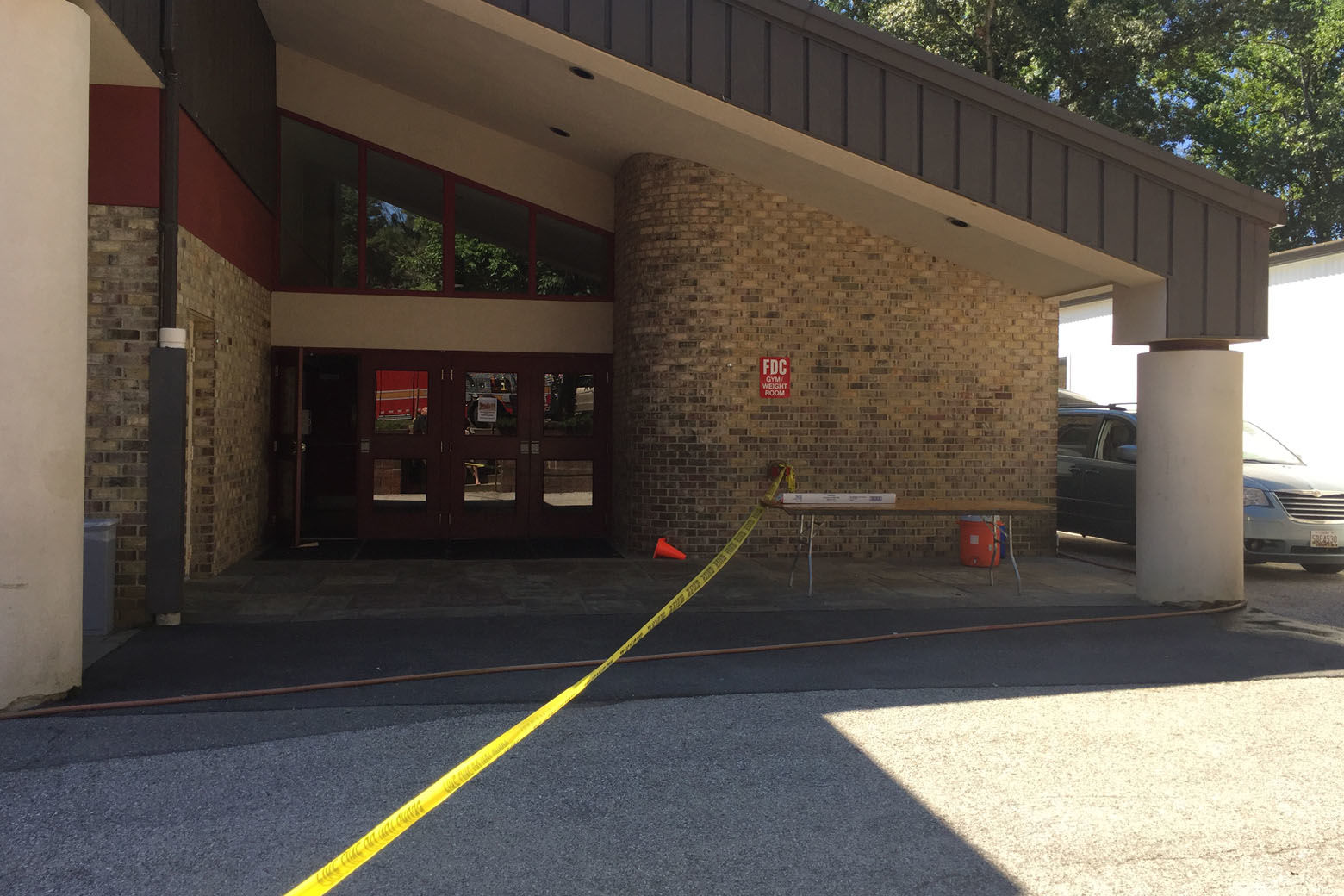 Caution tape is set up near the scene of a fatal construction accident at the Heights School in Potomac, Maryland. (WTOP/Kristi King)