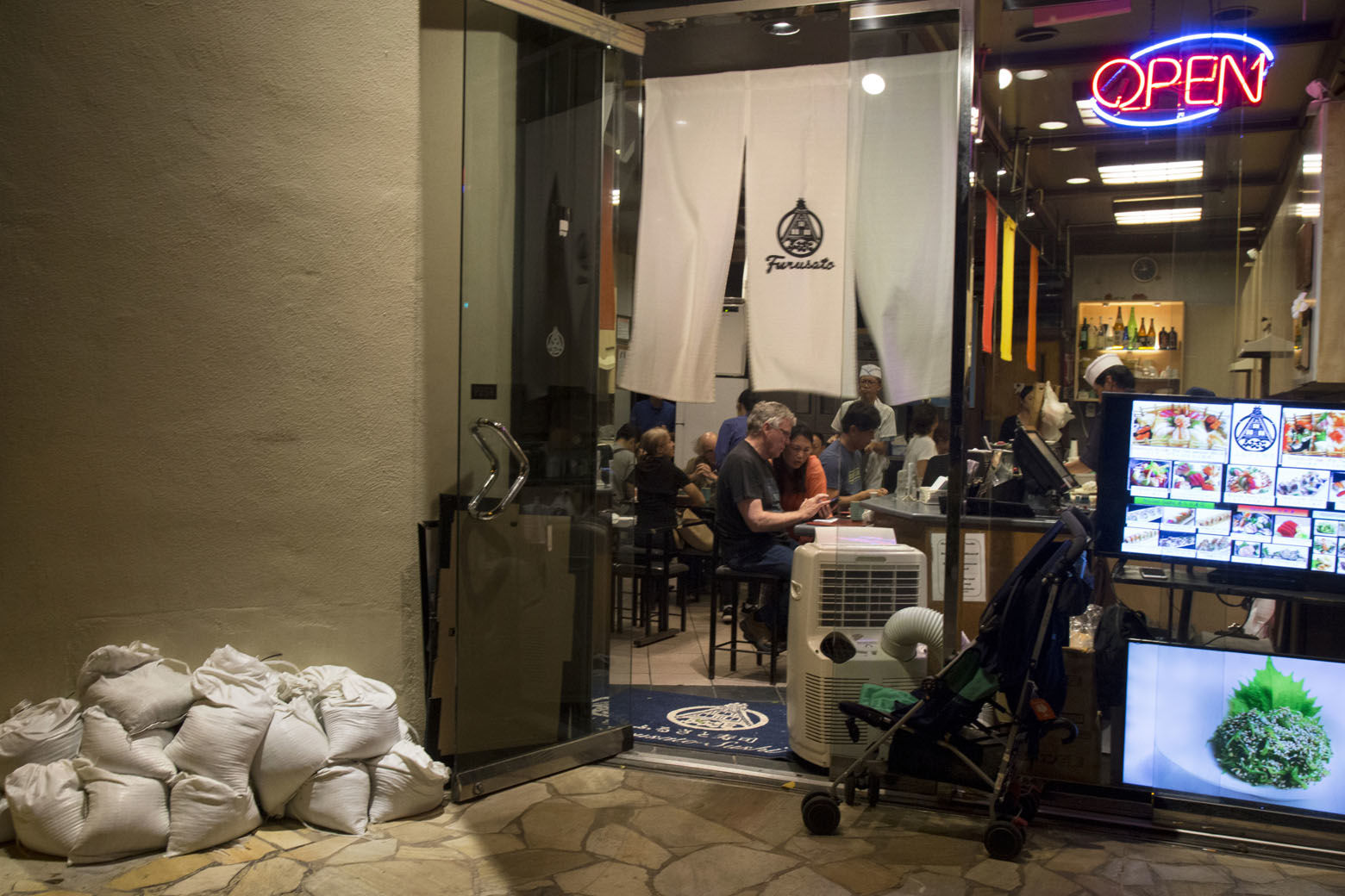 HONOLULU, HI - AUGUST 23: 2018   Furusato restaurant in the Hyatt Regency stayed open late but prepared sand bags to protect their Kalakaua Avenue store from flooding as Hurricane Lane approaches Waikiki Beach on Thursday, August 23, 2018 in Honolulu, Hi.  
(Photo by Kat Wade/Getty Images)