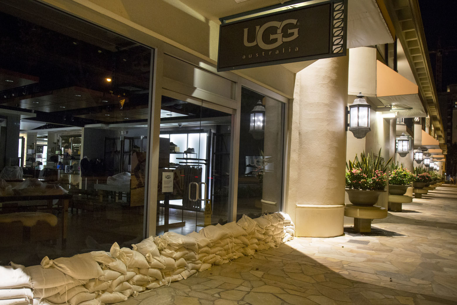 HONOLULU, HI - AUGUST 23: 2018   Ugg had the largest amount of sand bags to protect their Kalakaua Avenue store from flooding as any of the other stores as Hurricane Lane approaches Waikiki Beach on Thursday, August 23, 2018 in Honolulu, Hi.  
(Photo by Kat Wade/Getty Images)