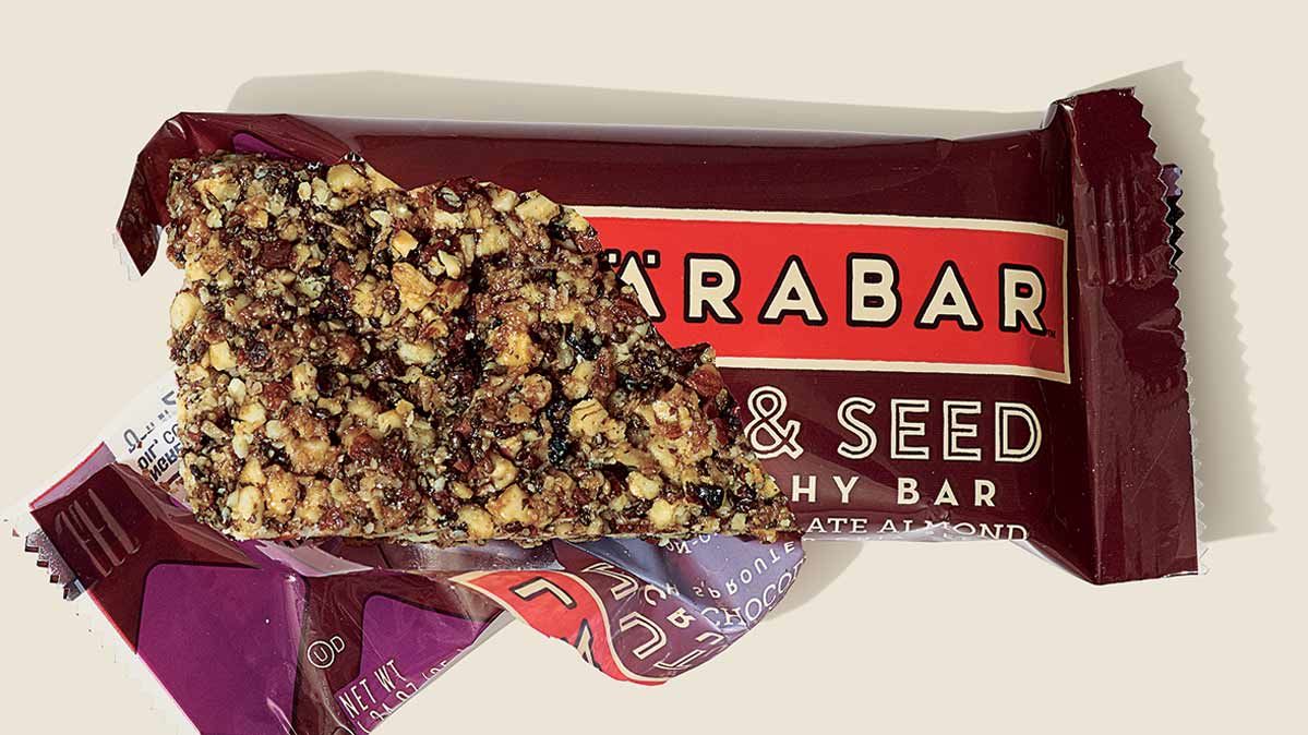 It tastes better than a pine cone. The Lärabar Nut & Seed Crunchy Bar Dark Chocolate Almond ingredients: almonds, honey, sprouted chia seeds, cacao nibs, unsweetened coconut, maple sugar, coconut oil, cocoa powder and sea salt. (Courtesy Consumer Reports)