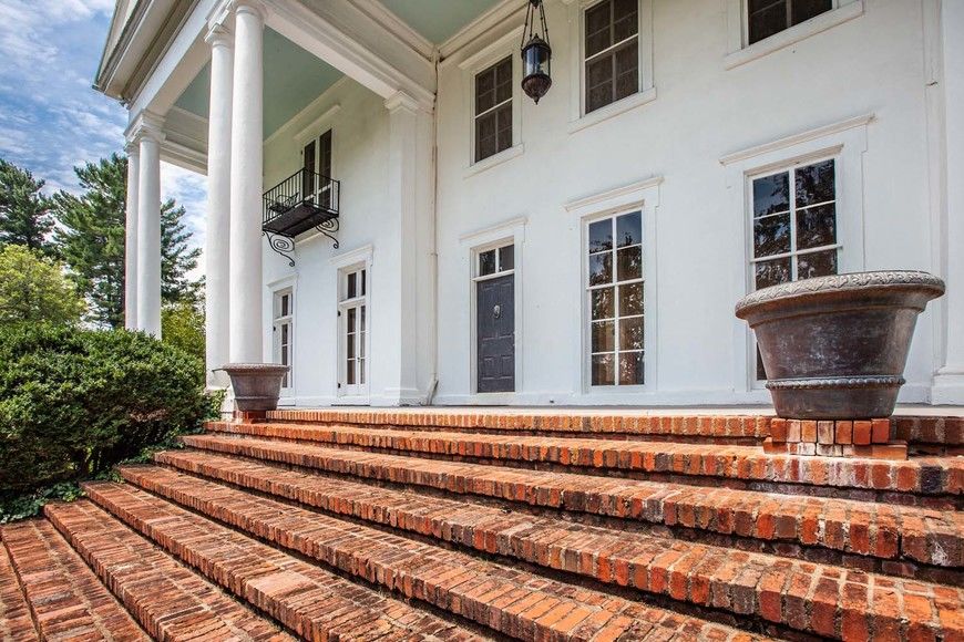 The circa 1853 mansion sits on 8.8 acres. (Courtesy Nicholls Auction Marketing Group)
