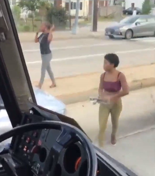 Dramatic video released by D.C. police shows a woman smashing the windows of a Greyhound bus with a car jack and attempting to run down the bus driver in Northeast D.C. Thursday. (Courtesy D.C. police)