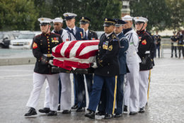 The flag-draped casket of Sen. John McCain, R-Ariz., is carried by joint service members into the U.S. Capitol, Friday, August 31, 2018 in Washington. (Jim Lo Scalzo/Pool photo via AP)