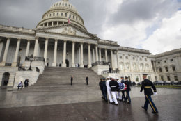 The flag-draped casket of Sen. John McCain, R-Ariz., is carried into the U.S. Capitol, Friday, Aug. 31, 2018, in Washington.  (Jim Lo Scalzo/Pool photo via AP)