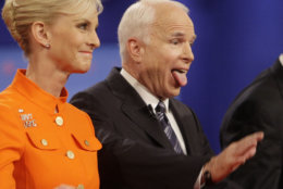 Republican presidential candidate Sen. John McCain, R-Ariz., right, joined by wife Cindy McCain, reacts to the crowd following his presidential debate against Democratic presidential candidate Sen. Barack Obama, D-Ill., at Hofstra University in Hempstead, N.Y., Wednesday, Oct. 15, 2008. (AP Photo/Seth Wenig)
