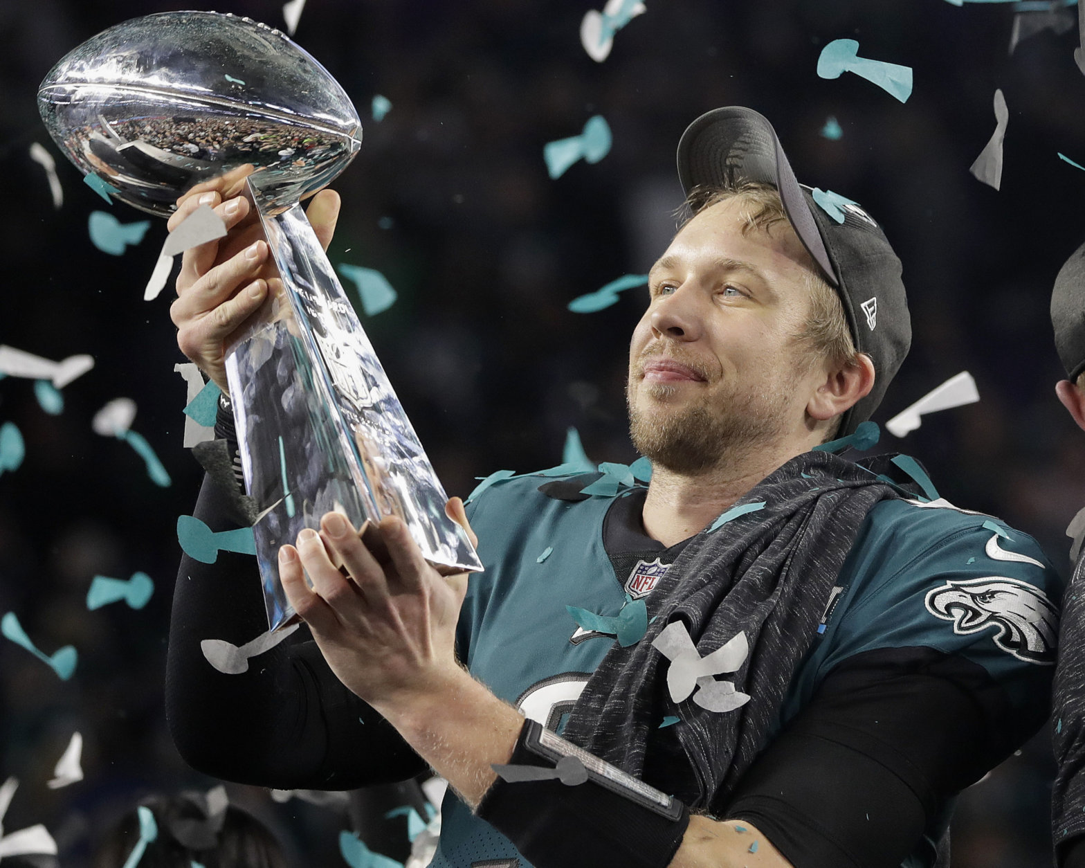 Philadelphia Eagles' Nick Foles holds up the Vince Lombardi Trophy after the NFL Super Bowl 52 football game against the New England Patriots, Sunday, Feb. 4, 2018, in Minneapolis. The Eagles won 41-33. (AP Photo/Matt Slocum)