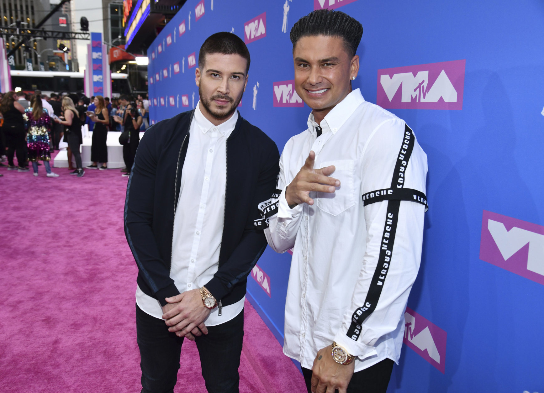Vinny Guadagnino, left, and Paul "DJ Pauly D" DelVecchio arrive at the MTV Video Music Awards at Radio City Music Hall on Monday, Aug. 20, 2018, in New York. (Photo by Charles Sykes/Invision/AP)