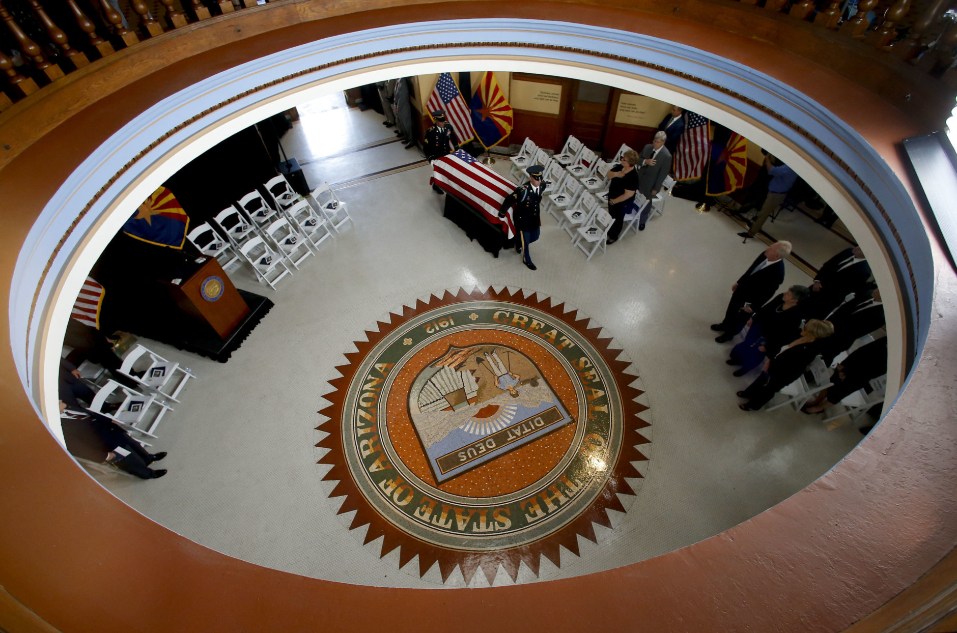 The Arizona National Guard moves the casket into the museum rotunda during a memorial service for Sen. John McCain, R-Ariz. at the Arizona Capitol on Wednesday, Aug. 29, 2018, in Phoenix. (AP Photo/Ross D. Franklin, Pool)
